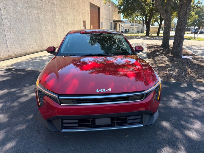 2025 Kia K4 LXS red front view VIN 3KPFT4DE7SE033635 Dallas TX