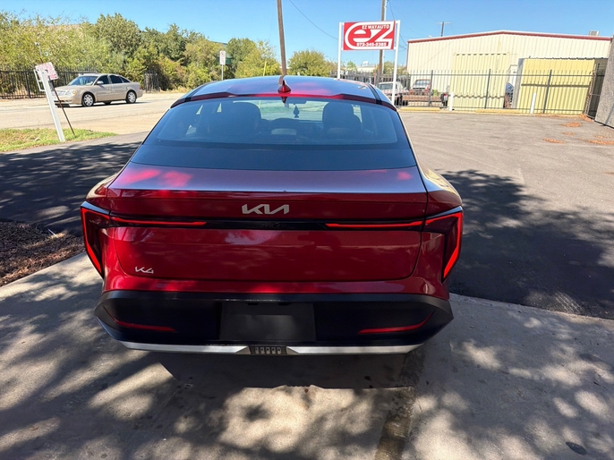 2025 Kia K4 LXS red rear view VIN 3KPFT4DE7SE033635 Dallas TX