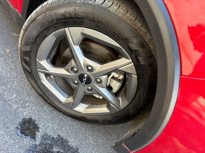 2025 Kia K4 LXS red alloy wheel and brake VIN 3KPFT4DE7SE033635 Dallas TX