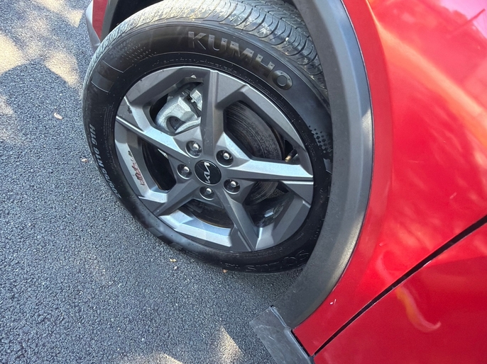 2025 Kia K4 LXS red alloy wheel VIN 3KPFT4DE7SE033635 Dallas TX