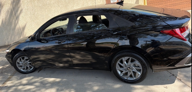 2025 Hyundai Elantra Blue HEV black black exterior side profile VIN KMHLM4DJ8SU173476 for sale Dallas TX